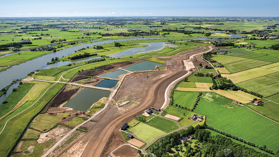 Aerial view of a floodplain being widened to take more water