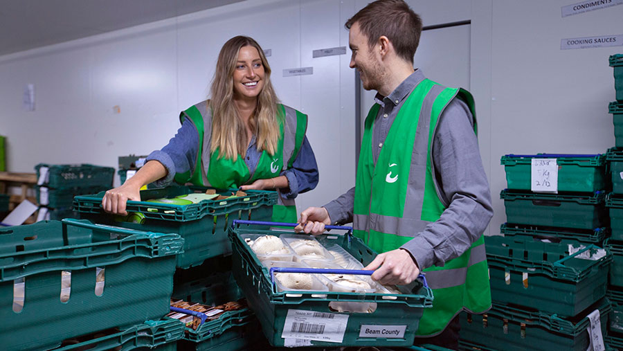 FareShare staff sorting the donated food 