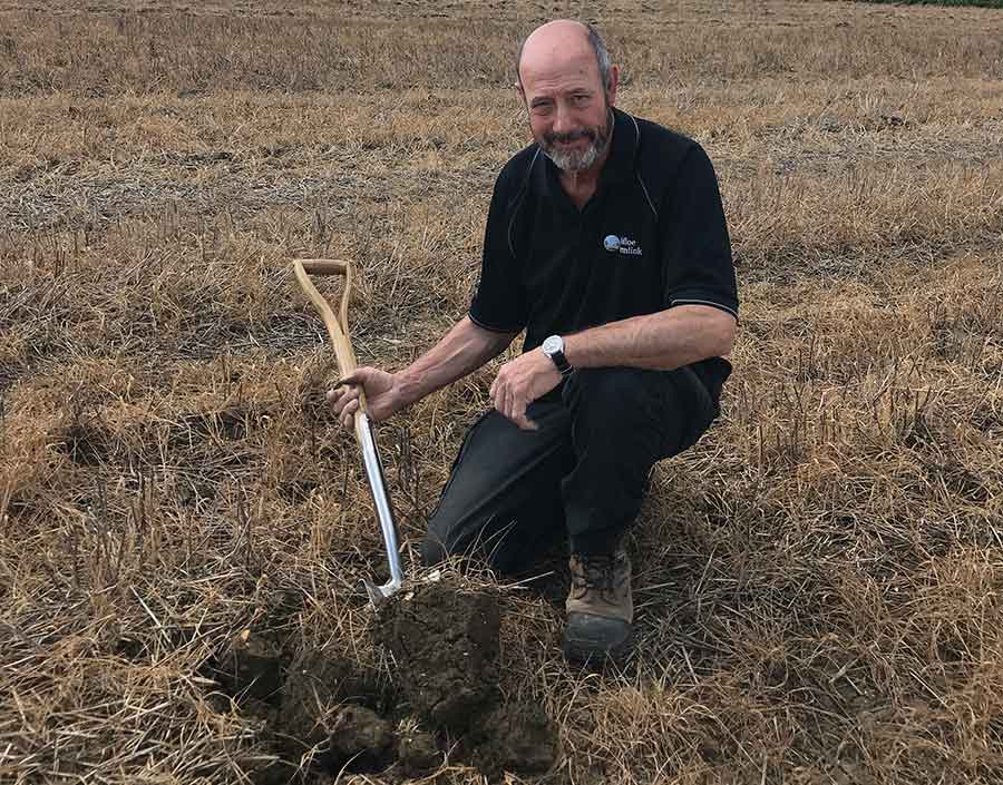 David Felce digging in his soils