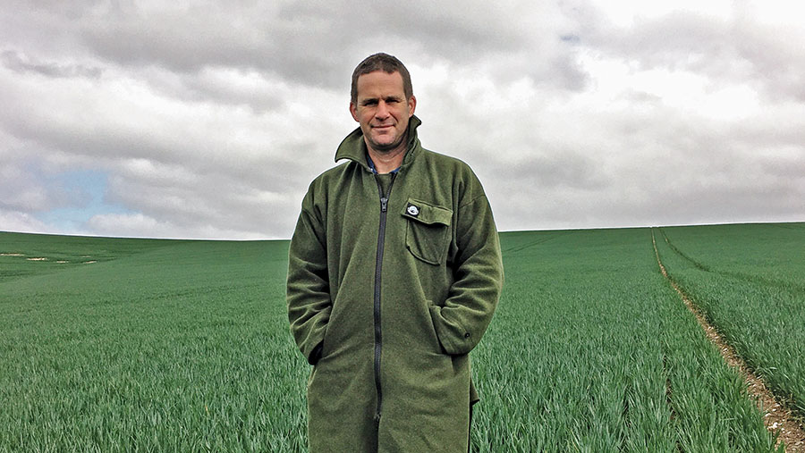 Duncan Ellis standing in field