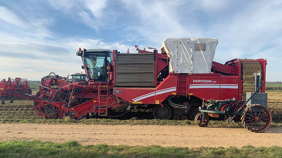 The Ivel is dwarfed by a modern Grimme potato harvester