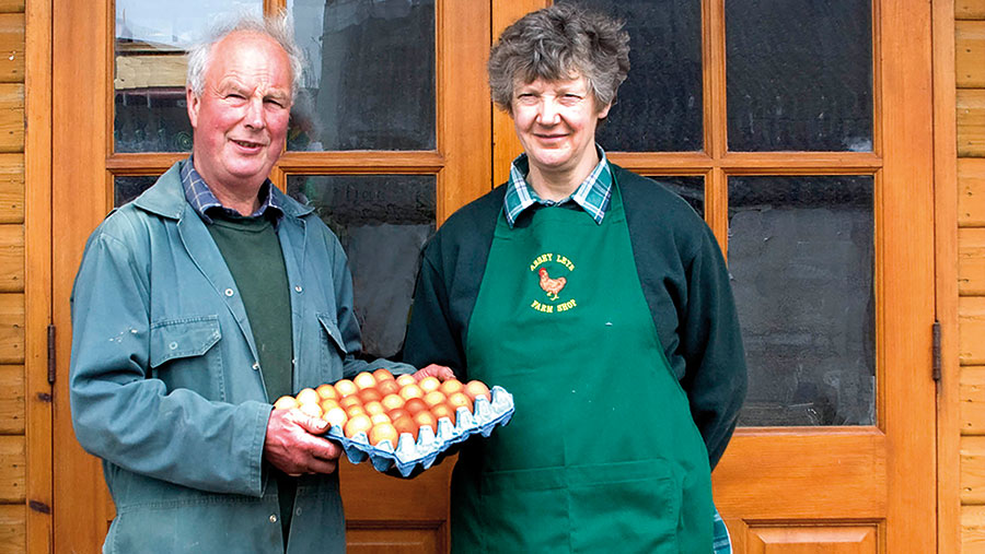 Tim and Janet  Harrison in front of shop with tray of eggs