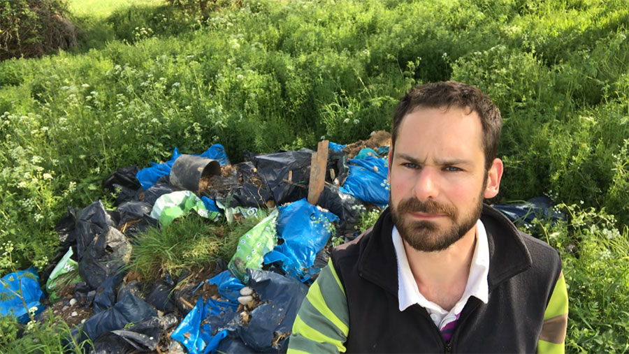 Richard Heady in the field with fly-tipped 