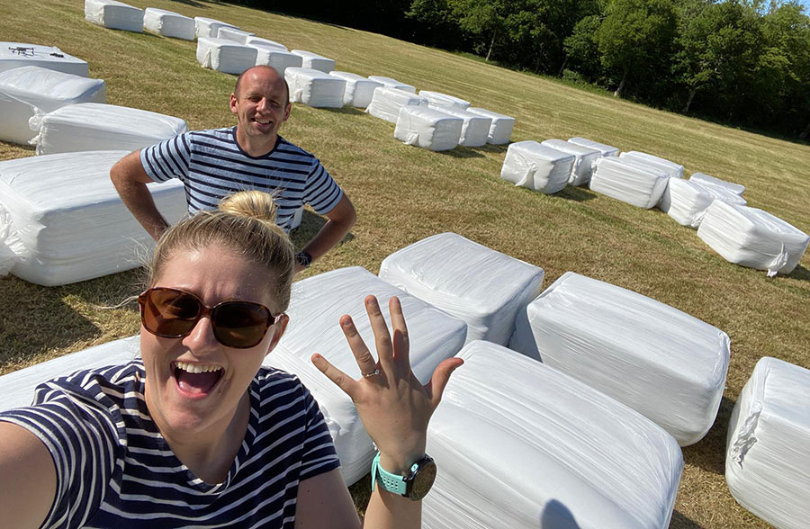 Mark Howard-Smith and Lucy with the hay bales