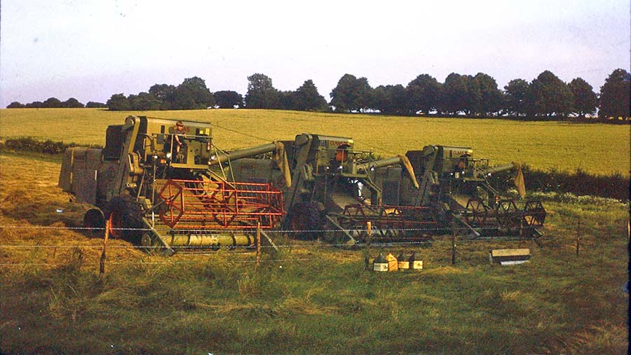 A young Charlie Flindt sat on an old combine harvester