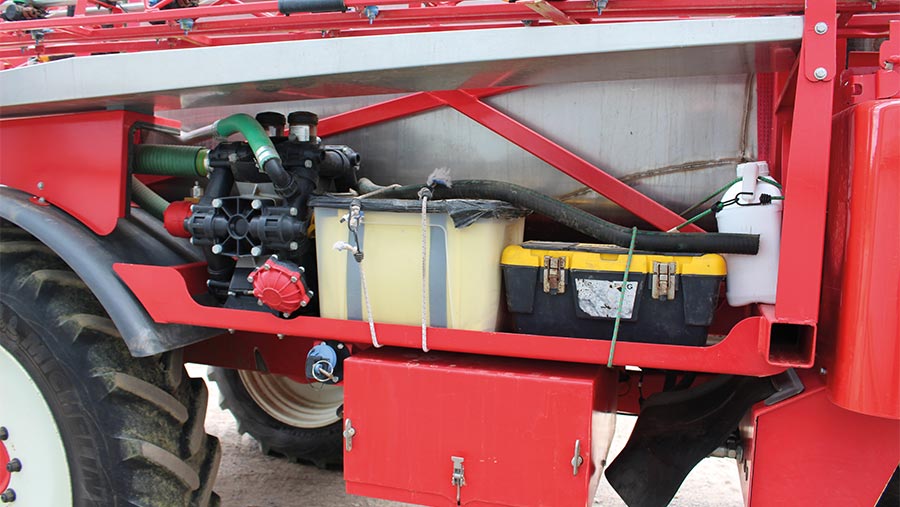 Bungy straps securing toolboxes on Bateman sprayer