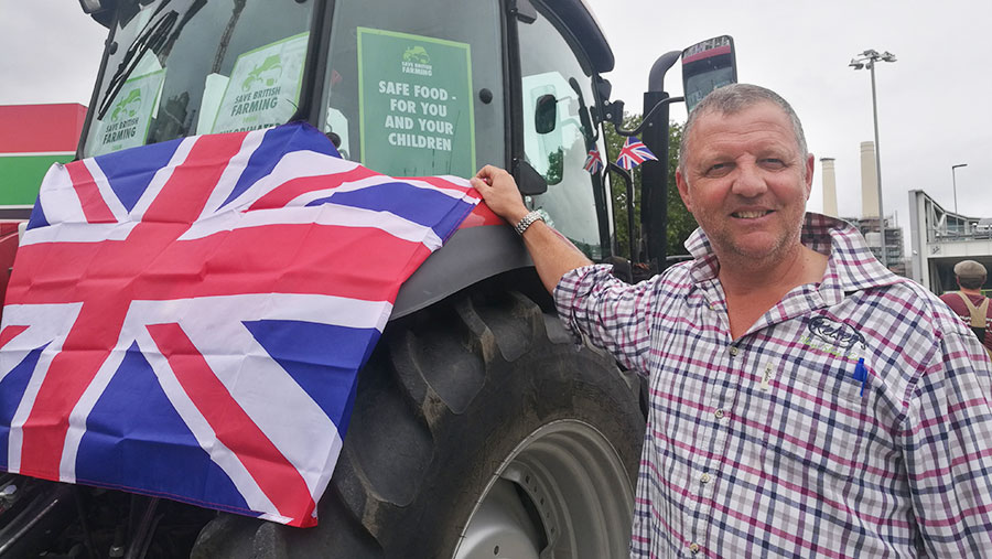 Bill Kelsey in front of tractor at food standards demo in London