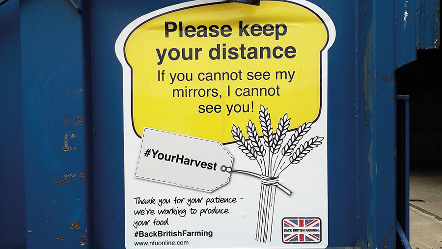 Sticker reads: please keep your distance