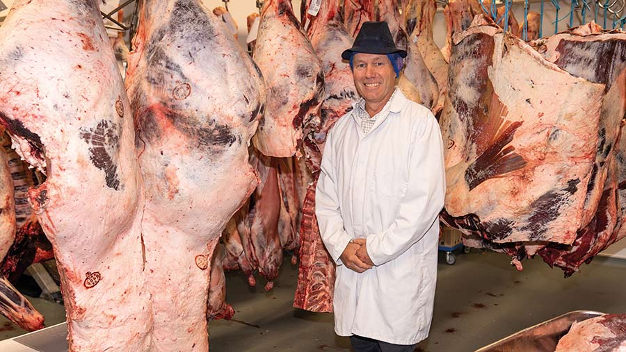 Andrew Hodgson with beef carcasses