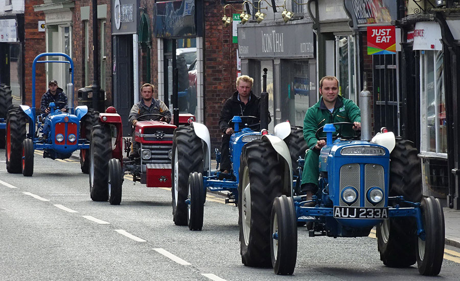 Vintage tractors on the road