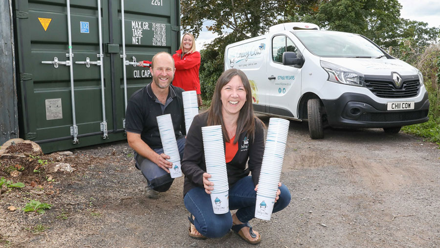 Anna and David Taylor, of Chilly Cow ice cream, with Lisa James, of Container Sales Centre, with the new storage container on the farm where they make the award-winning Chilly Cow ice-cream  © Rick Matthews