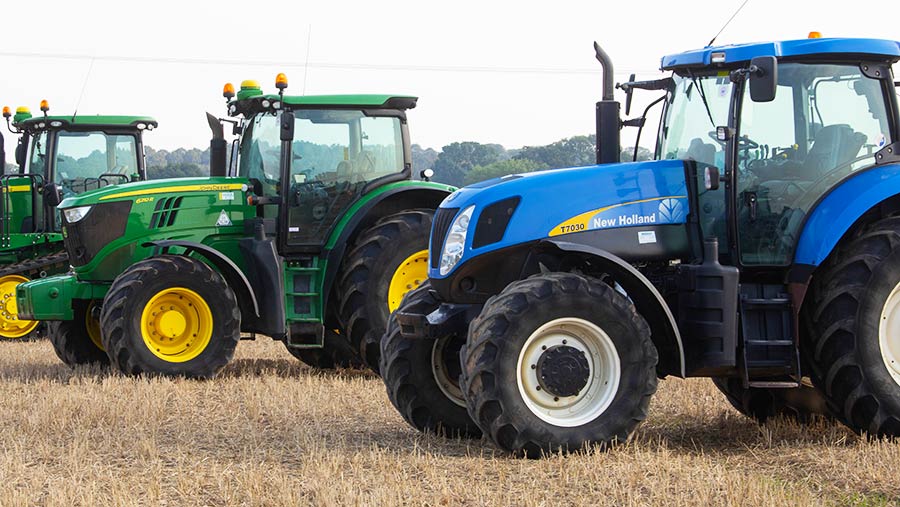 Row of tractors and the R and T machinery sale