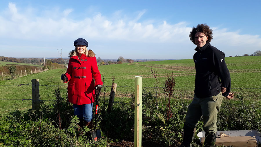 TV presenter Nicki Chapman and SDNPA woodlands officer Bob Epsom planting the first tree for Trees for the Downs