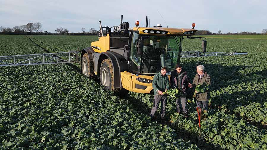 Paul Hovesen and team with tractor in field
