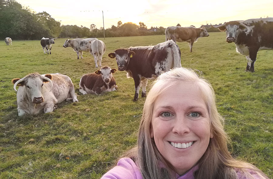 Katie Mitcham takes selfie with cows