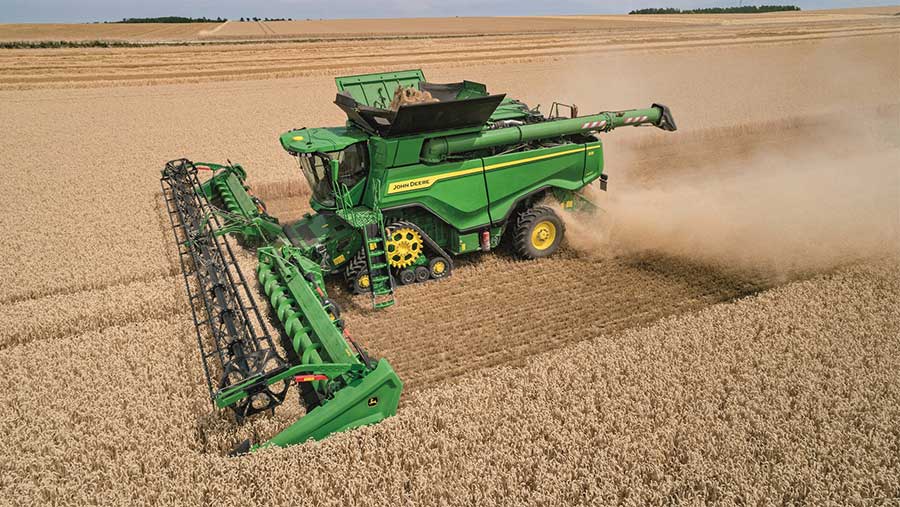 Aerial view of John Deere X9 in wheat field 