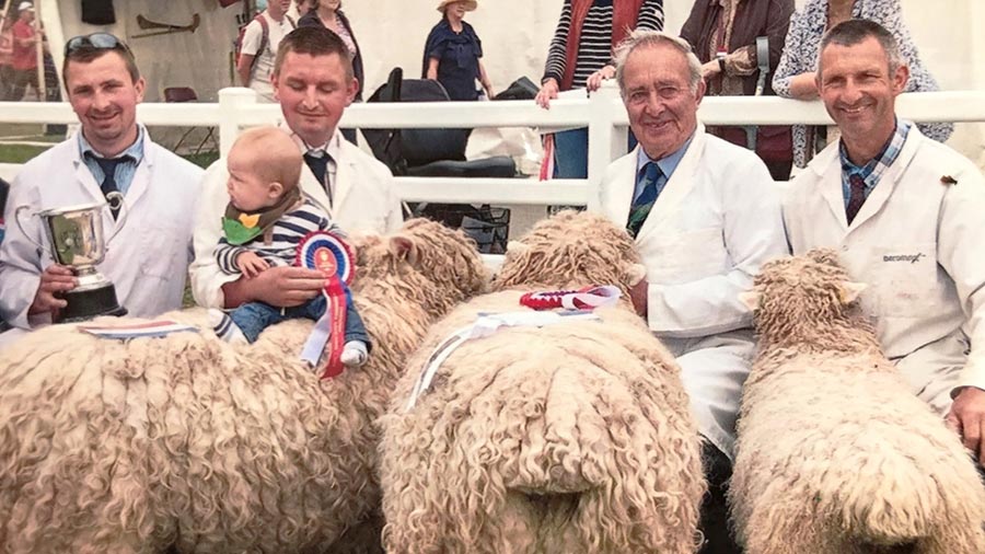 Matt Darke with family and sheep at a show