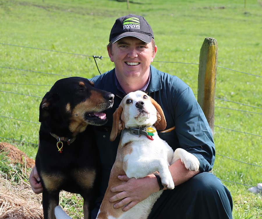 Wayne Langford with two dogs