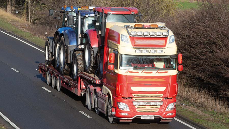 Vehicle carrying tractors