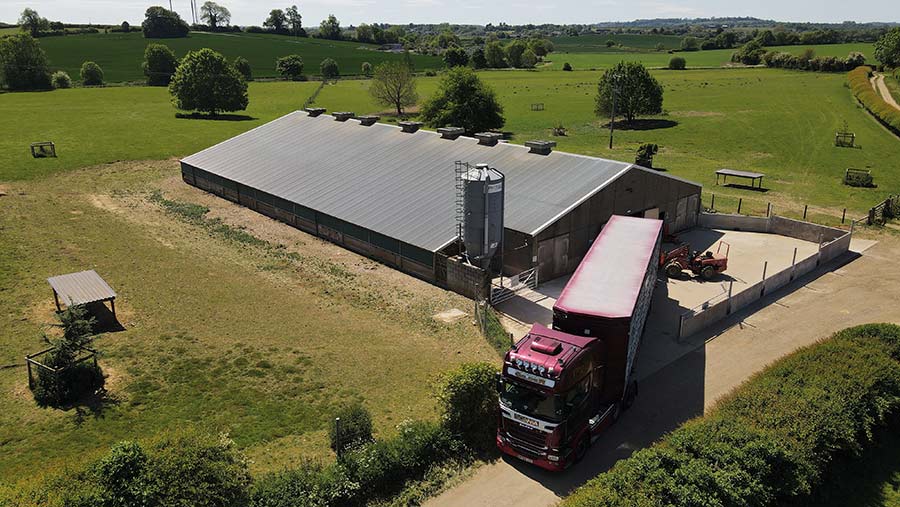 Aerial view of farm shed and an articulated lorry