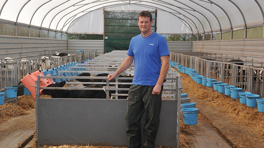Jonathan Evens in the polytunnel © Debbie James