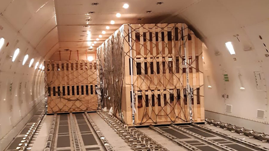 Wooden crates inside an aircraft