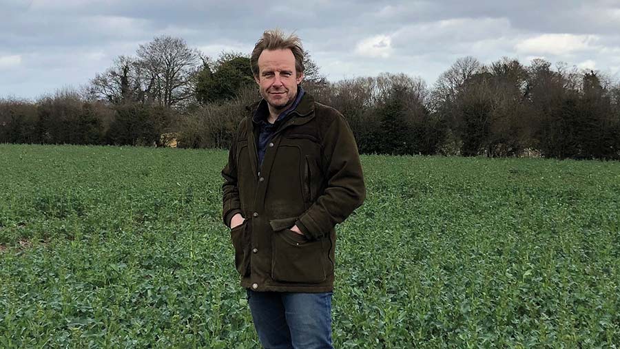 Farmer Kit Papworth in a field