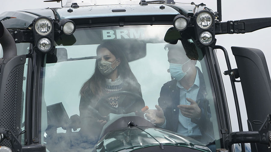 Duke and Duchess of Cambridge in tractor