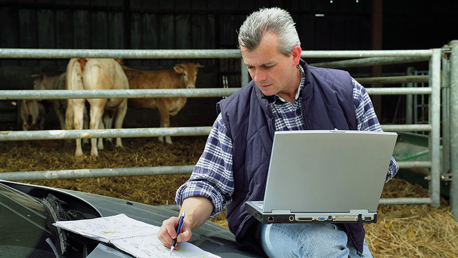 Farmer with laptop