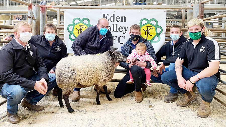 Hywel Williams with Hywel Blue Texel with Eden Valley YFC members, Ben Richardson and daughter Millie