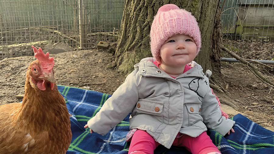 Girl with chicken