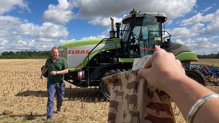 Tractor and paper bag of lunch