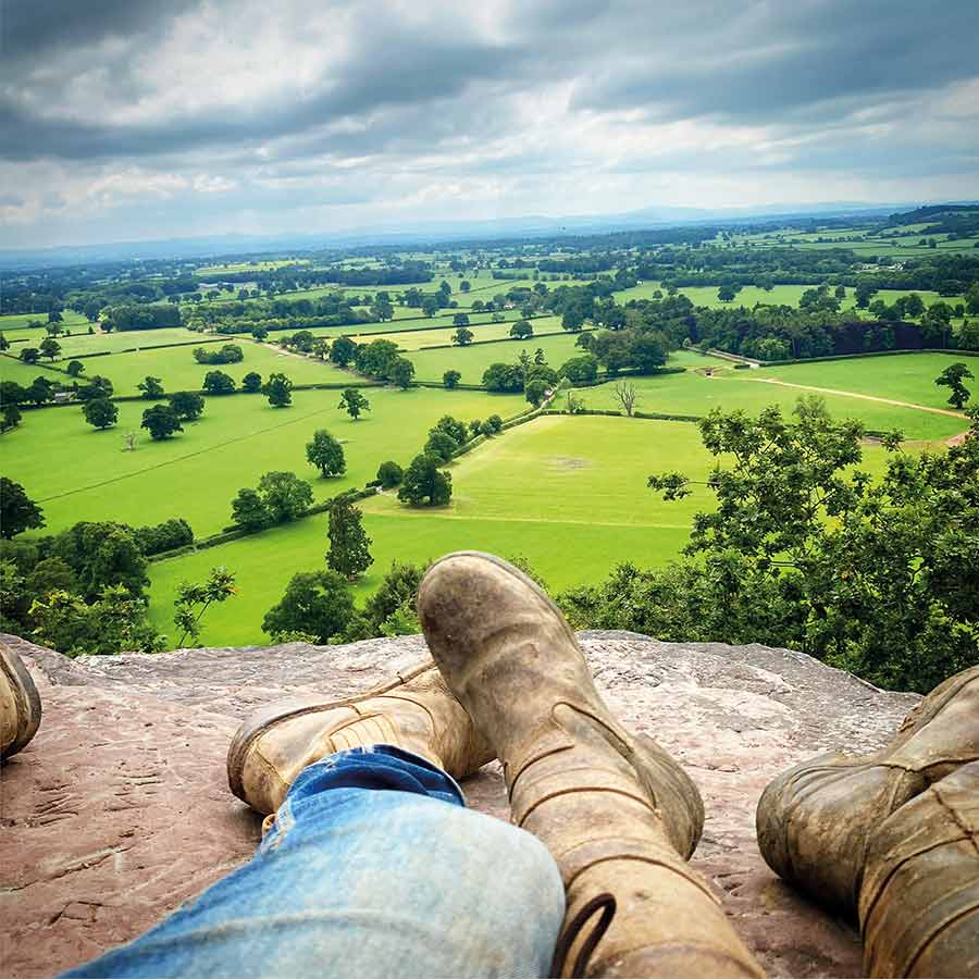Legs and feet and view of landscape