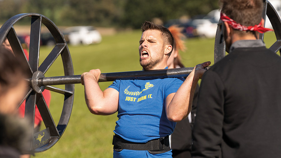 Rob Strawbridge lifting weights