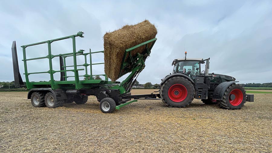 Pairs of bales are are rotated to either a vertical or horizontal position by the pick-up head © Nick Fone