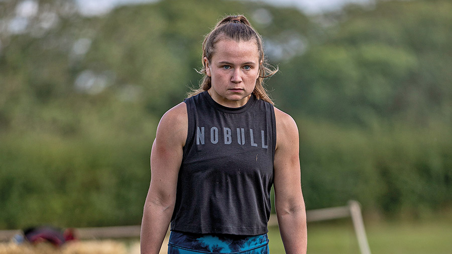 Heidi Wilson lifting a weight