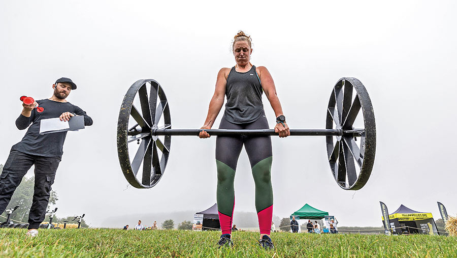 Isobel Brown lifting a weight