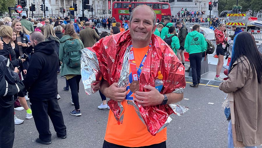 Tom Bradshaw at the end of the marathon