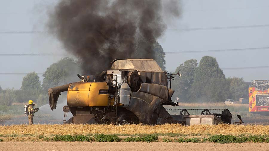 Combine on fire with plume of black smoke