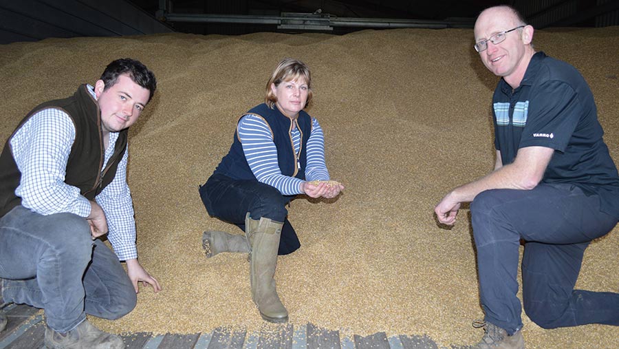 farmers in grain store