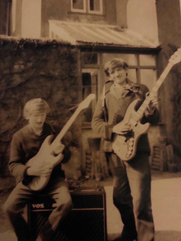 Charles and Kingsley Ward with guitars