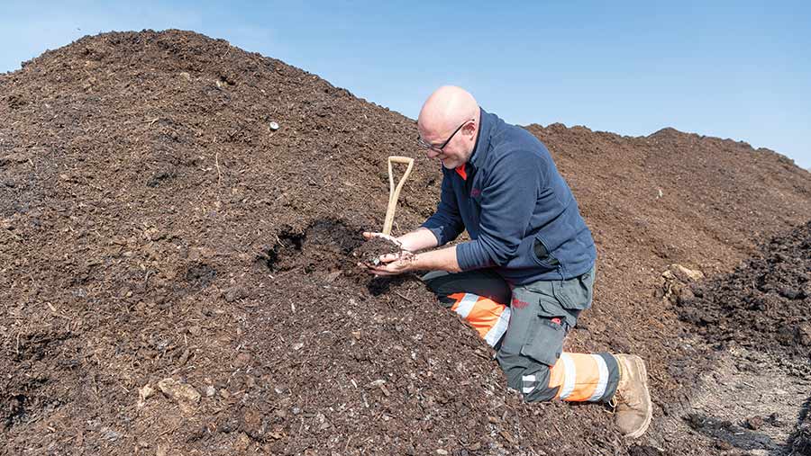 Richard Scholes on compost heap