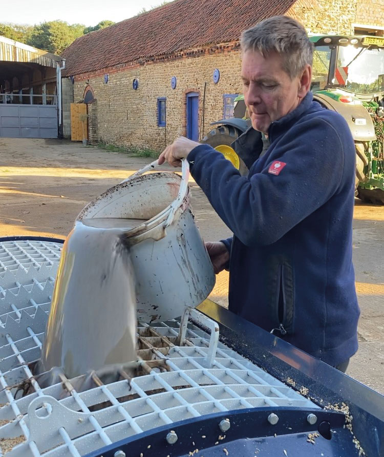 Andrew Jackson mixing the extract with the seed 