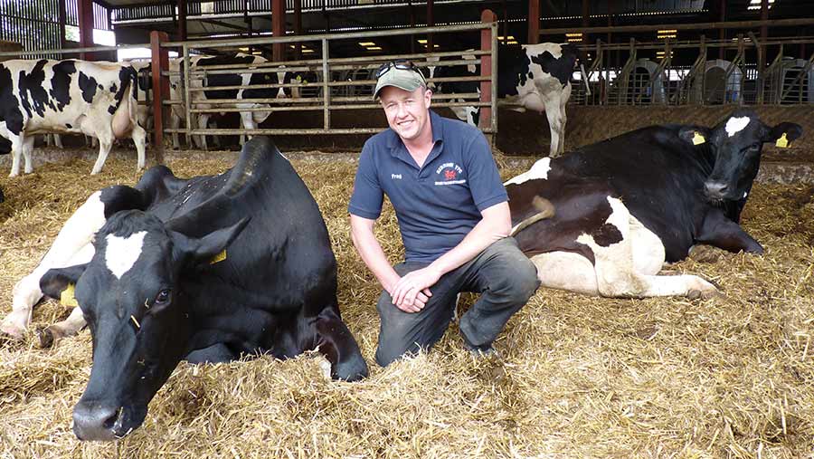 Fraser Jones with cows