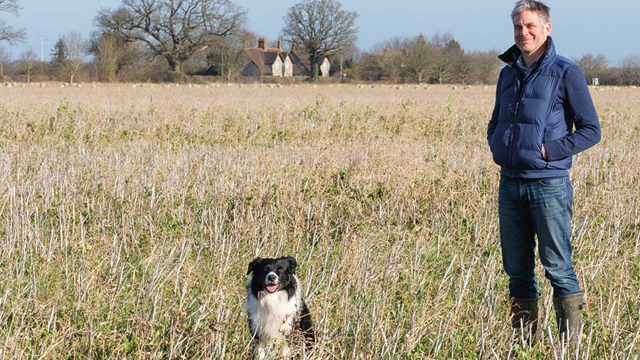 Mike Purnell on farm with his sheepdog