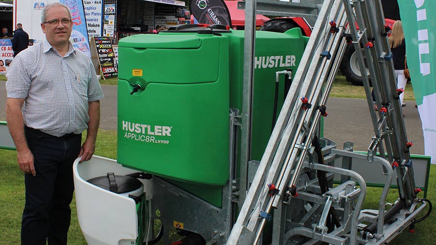 Mike Gibbs of Hustler with the Contractor-spec mounted sprayer