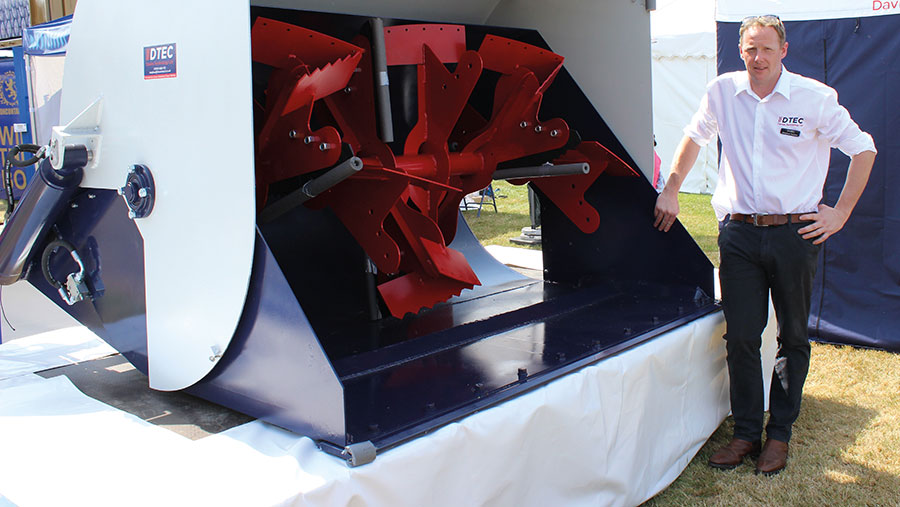 Stephen Davies with his loader-mounted 1cu m ration mixer-feeder