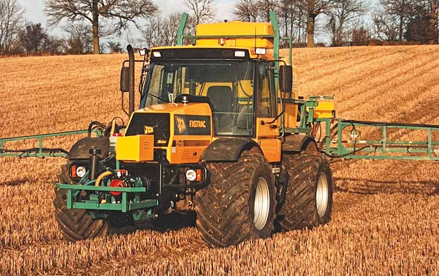 JCB tractor with cultivator