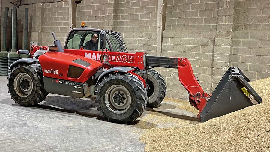 Telehandler working in a grain store