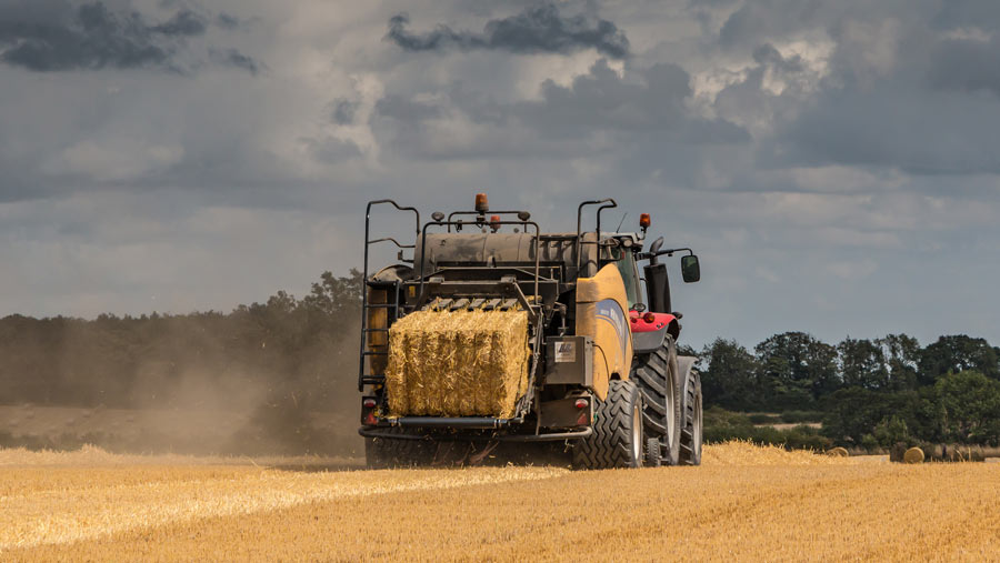 Massey tractor and New Holland baler